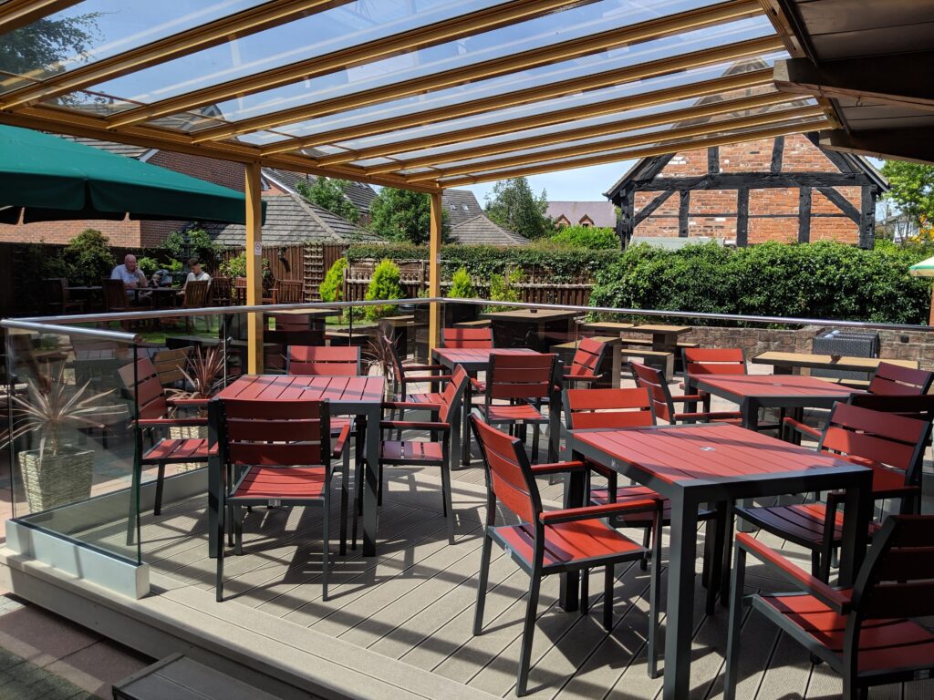 Veranda finished with chairs and tables