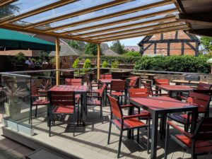 Veranda finished with chairs and tables