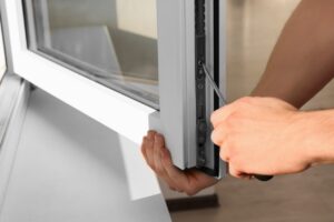 person installing UPVC Windows